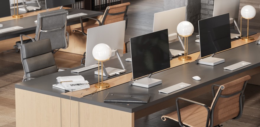 Modern workspace with multiple monitors and keyboards and fancy lamps